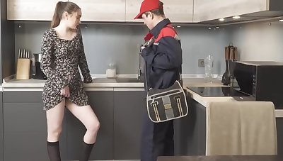 Spoiled girl tempts plumber secure spontaneous sex in the kitchenette
